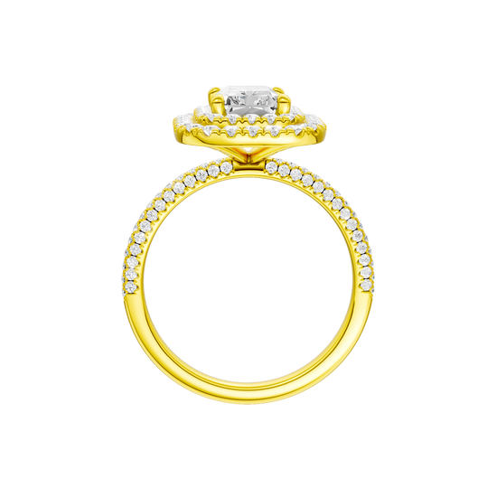 A profile view of the Radiant cut diamond engagement ring in 14k yellow gold with a pavé diamond band and solitaire setting