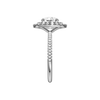 A side view of the Round cut diamond engagement ring in platinum with a pavé diamond band and solitaire setting