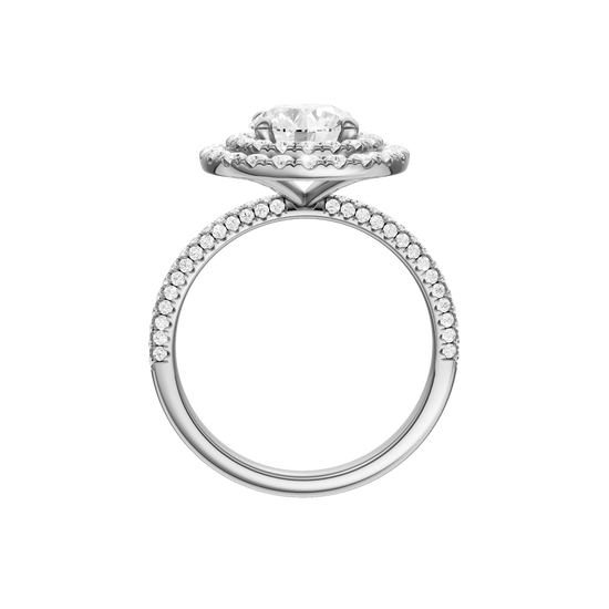 A profile view of the Round cut diamond engagement ring in 14k white gold with a pavé diamond band and solitaire setting