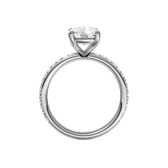 A profile view of the Elongated cushion cut diamond engagement ring in 14k white gold with a prong diamond band and cathedral setting