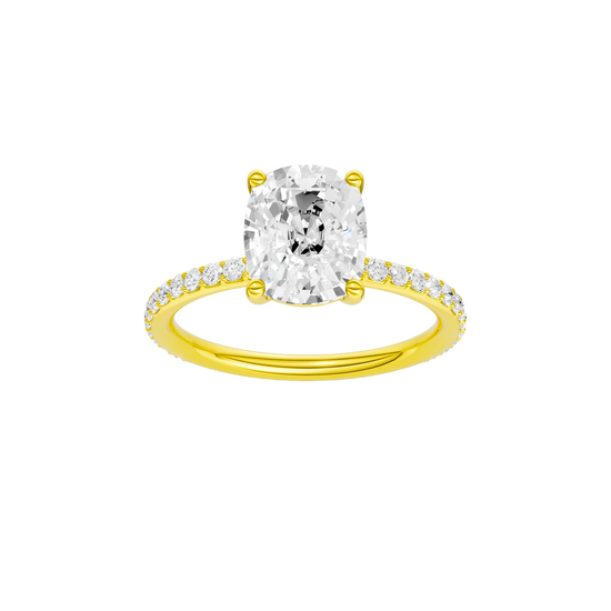 A front view of the Elongated cushion cut diamond engagement ring in 14k yellow gold with a prong diamond band and cathedral setting