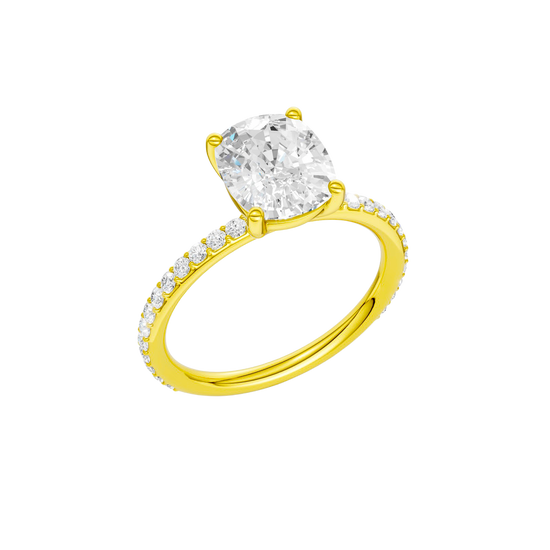 A three-quarter view of the Elongated cushion cut diamond engagement ring in 14k yellow gold with a prong diamond band and cathedral setting