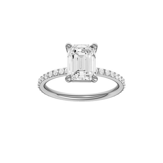 A front view of the Emerald cut diamond engagement ring in 14k white gold with a prong diamond band and cathedral setting