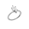 A three-quarter view of the Marquise cut diamond engagement ring in 14k white gold with a prong diamond band and cathedral setting