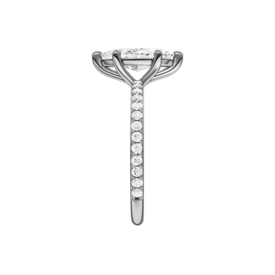 A side view of the Marquise cut diamond engagement ring in 14k white gold with a prong diamond band and cathedral setting