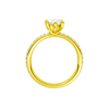 A profile view of the Marquise cut diamond engagement ring in 14k yellow gold with a prong diamond band and cathedral setting