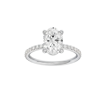 A front view of the Oval cut diamond engagement ring in 14k white gold with a prong diamond band and cathedral setting