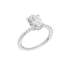 A three-quarter view of the Oval cut diamond engagement ring in 14k white gold with a prong diamond band and cathedral setting