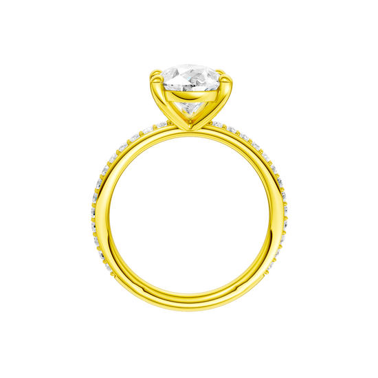 A profile view of the Pear cut diamond engagement ring in 14k yellow gold with a prong diamond band and cathedral setting