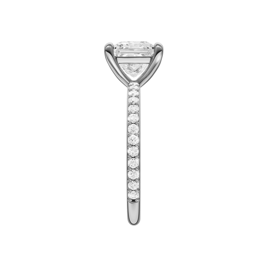 A side view of the Princess cut diamond engagement ring in 14k white gold with a prong diamond band and cathedral setting