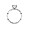 A profile view of the radiant cut diamond engagement ring in 14k white gold with a prong diamond band and cathedral setting