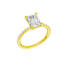 A three-quarter view of the radiant cut diamond engagement ring in 14k yellow gold with a prong diamond band and cathedral setting