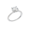 A three-quarter view of the Round cut diamond engagement ring in 14k white gold with a prong diamond band and cathedral setting