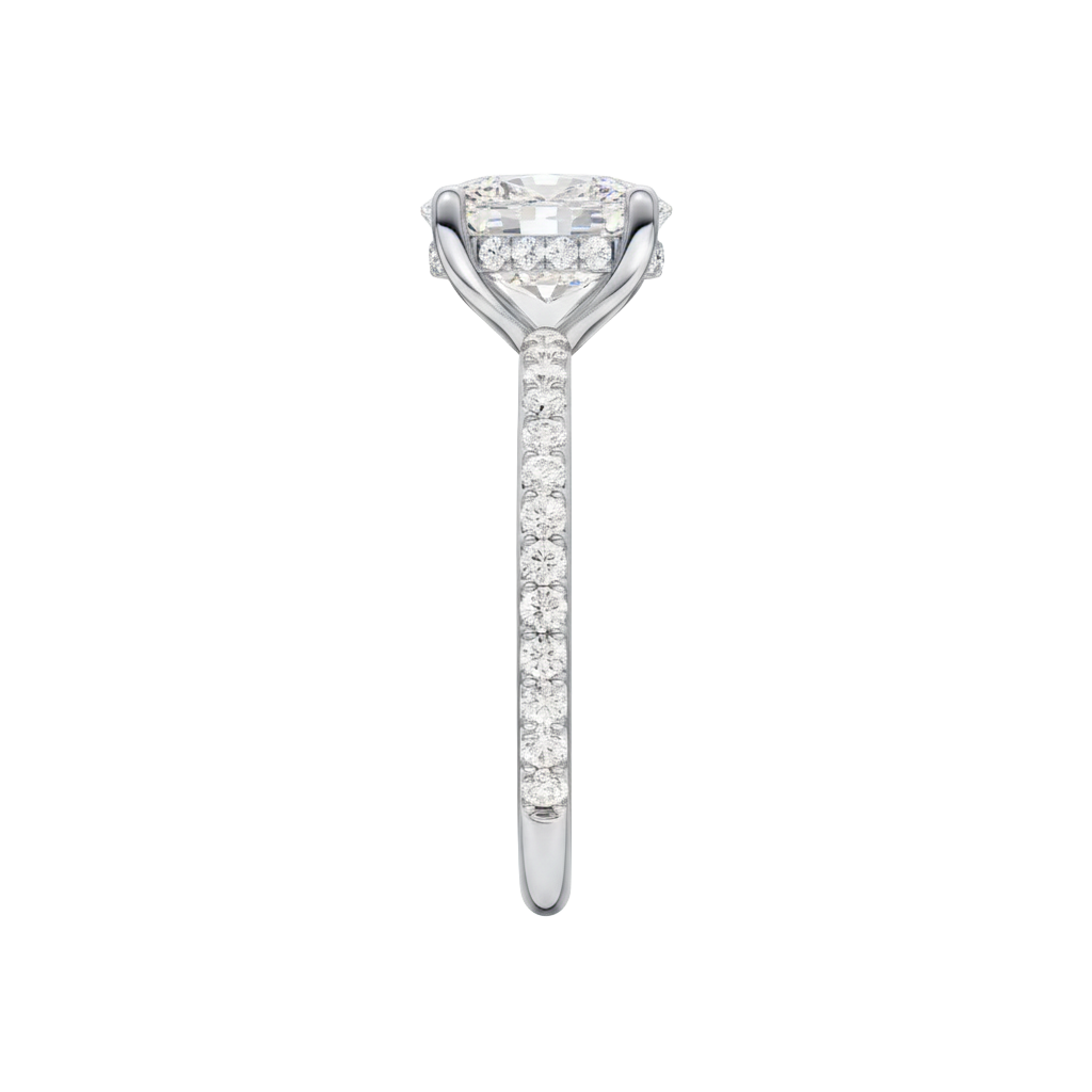 A side view of the Elongated cushion cut diamond engagement ring in 14k white gold with a prong diamond band and cathedral setting