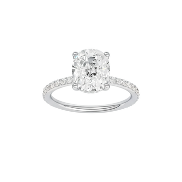 A front view of the Elongated cushion cut diamond engagement ring in 14k white gold with a prong diamond band and cathedral setting