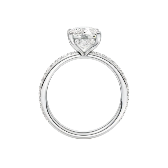 A profile view of the Elongated cushion cut diamond engagement ring in 14k white gold with a prong diamond band and cathedral setting