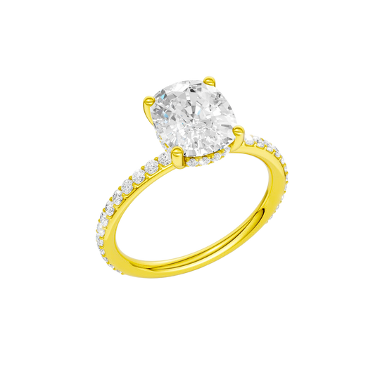 A three-quarter view of the Elongated cushion cut diamond engagement ring in 14k yellow gold with a prong diamond band and cathedral setting