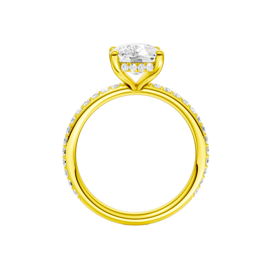 A profile view of the Elongated cushion cut diamond engagement ring in 14k yellow gold with a prong diamond band and cathedral setting