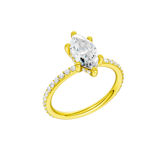 A three-quarter view of the Marquise cut diamond engagement ring in 14k yellow gold with a prong band and hidden halo setting