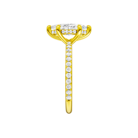 A side view of the Marquise cut diamond engagement ring in 14k yellow gold with a prong band and hidden halo setting