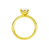 A profile view of the Marquise cut diamond engagement ring in 14k yellow gold with a prong band and hidden halo setting