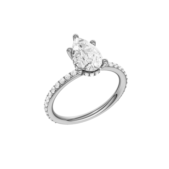A three-quarter view of the Pear cut diamond engagement ring in 14k white gold with a prong diamond band and cathedral setting