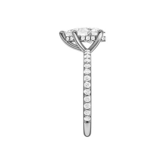 A side view of the Pear cut diamond engagement ring in 14k white gold with a prong diamond band and cathedral setting