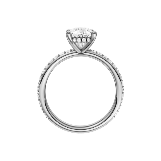A profile view of the Pear cut diamond engagement ring in 14k white gold with a prong diamond band and cathedral setting