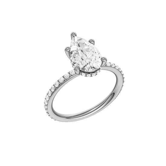 A three-quarter view of the Pear cut diamond engagement ring in platinum with a prong diamond band and cathedral setting