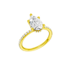 A three-quarter view of the Pear cut diamond engagement ring in 14k yellow gold with a prong diamond band and cathedral setting
