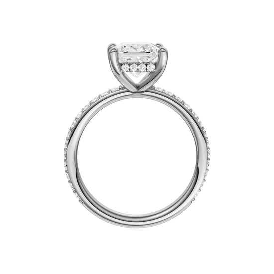A profile view of the Princess cut diamond engagement ring in 14k white gold with a prong diamond band and cathedral setting