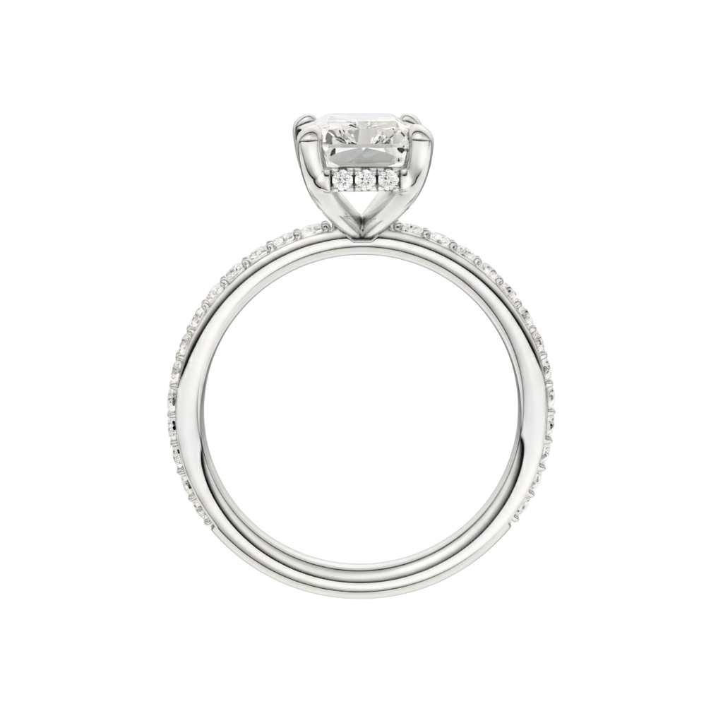 A profile view of the Radiant cut diamond engagement ring in platinum with a diamond band and hidden halo, cathedral setting