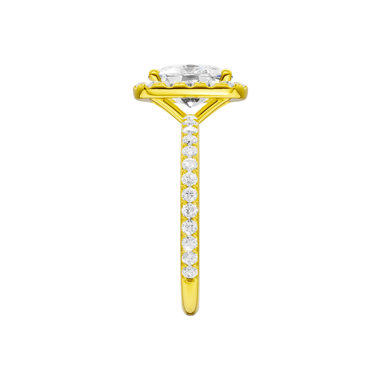 A side view of the Elongated Cushion cut diamond engagement ring in 14k yellow gold with a prong band and solitaire