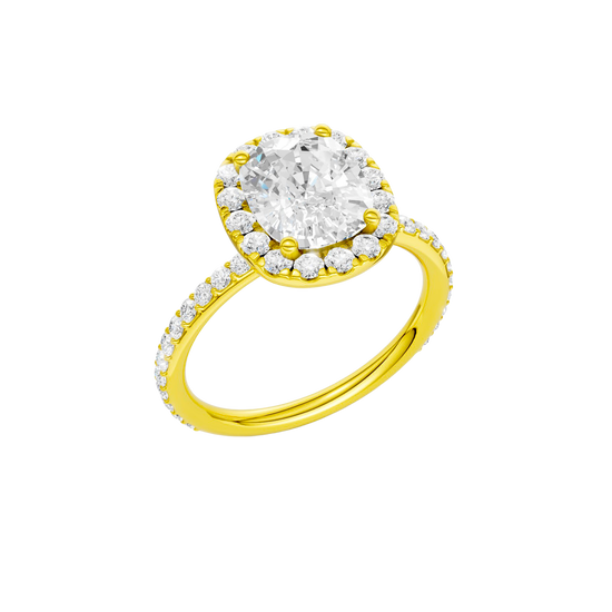 A three-quarter view of the Elongated Cushion cut diamond engagement ring in 14k yellow gold with a prong band and solitaire setting
