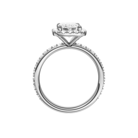 A profile view of the Emerald cut diamond engagement ring in platinum with a prong diamond band and cathedral setting