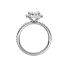 A profile view of the Emerald cut diamond engagement ring in platinum with a prong diamond band and cathedral setting