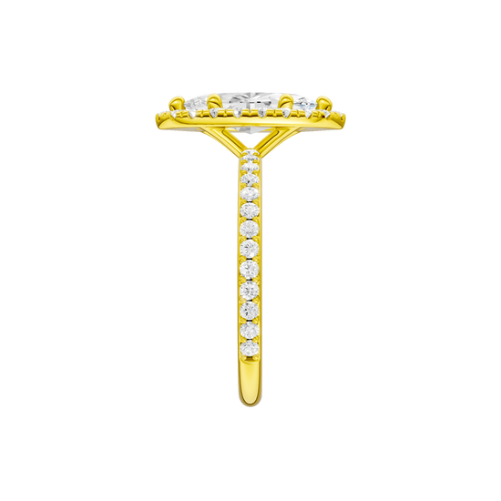 A side view of the Marquise cut diamond engagement ring in 14k yellow gold with a prong diamond band and cathedral setting