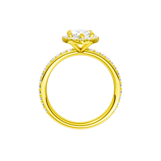 A profile view of the Marquise cut diamond engagement ring in 14k yellow gold with a prong diamond band and cathedral setting