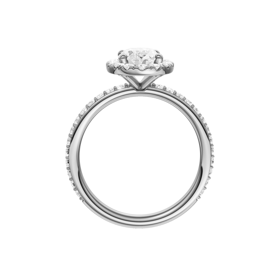 A profile view of the Oval cut diamond engagement ring in 14k white gold with a prong diamond band and cathedral setting