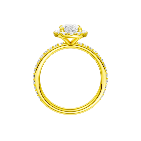 A profile view of the Oval cut diamond engagement ring in 14k yellow gold with a prong diamond band and cathedral setting