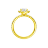 A profile view of the Oval cut diamond engagement ring in 14k yellow gold with a prong diamond band and cathedral setting