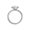 A profile view of the Pear cut diamond engagement ring in 14k white gold with a prong diamond band and cathedral setting