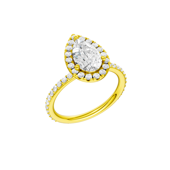 A three-quarter view of the Pear cut diamond engagement ring in 14k yellow gold with a prong diamond band and cathedral setting