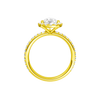 A profile view of the Pear cut diamond engagement ring in 14k yellow gold with a prong diamond band and cathedral setting