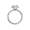 A profile view of the radiant cut diamond engagement ring in 14k white gold with a prong diamond band and cathedral setting