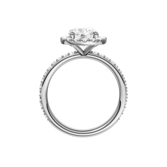 A profile view of the Round cut diamond engagement ring in 14k white gold with a prong diamond band and cathedral setting