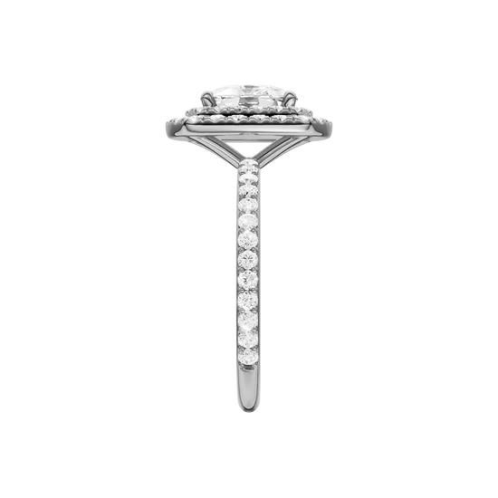 A side view of the Elongated cushion cut diamond engagement ring in 14k white gold with a prong diamond band and cathedral setting