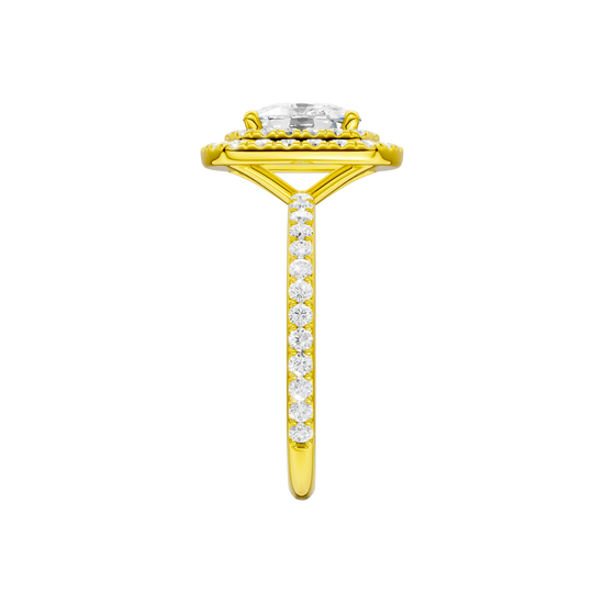 A side view of the Elongated cushion cut diamond engagement ring in 14k yellow gold with a prong diamond band and cathedral setting