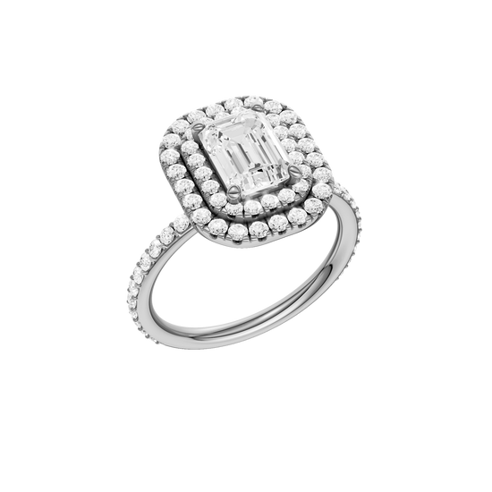 A three-quarter view of the Emerald cut diamond engagement ring in platinum with a prong diamond band and cathedral setting