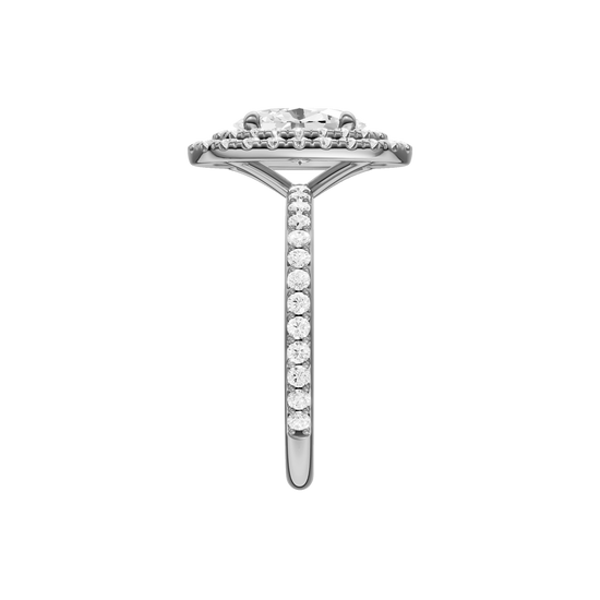 A side view of the Oval cut diamond engagement ring in platinum with a prong diamond band and cathedral setting